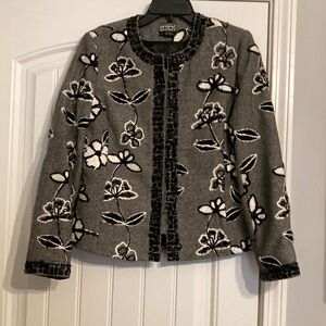 Black and small tweed jacket